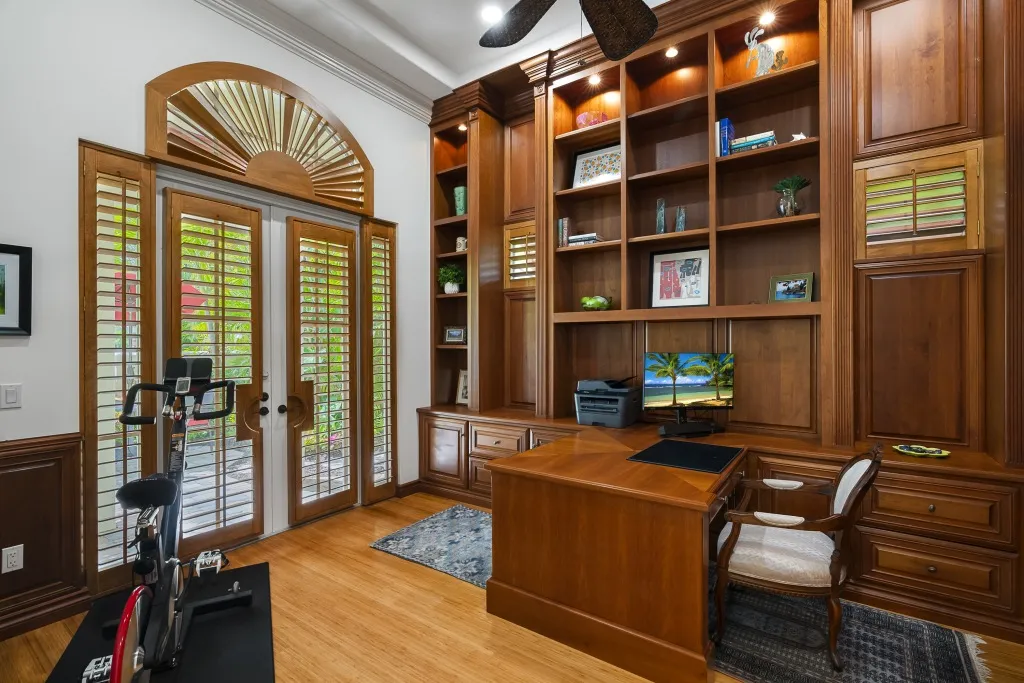 1710 Lake Club Court: the library, behind its bespoke wall of built-ins