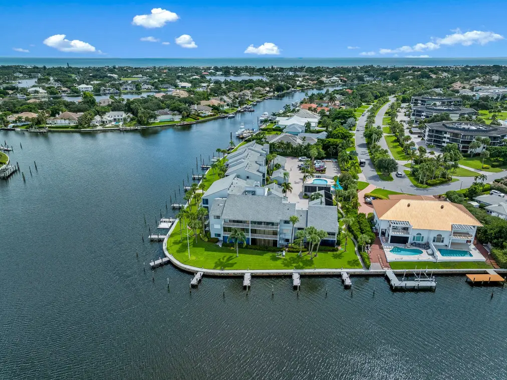 1776 Mooringline Drive, PH-C: an aerial of the point, with the Indian River Lagoon on either side