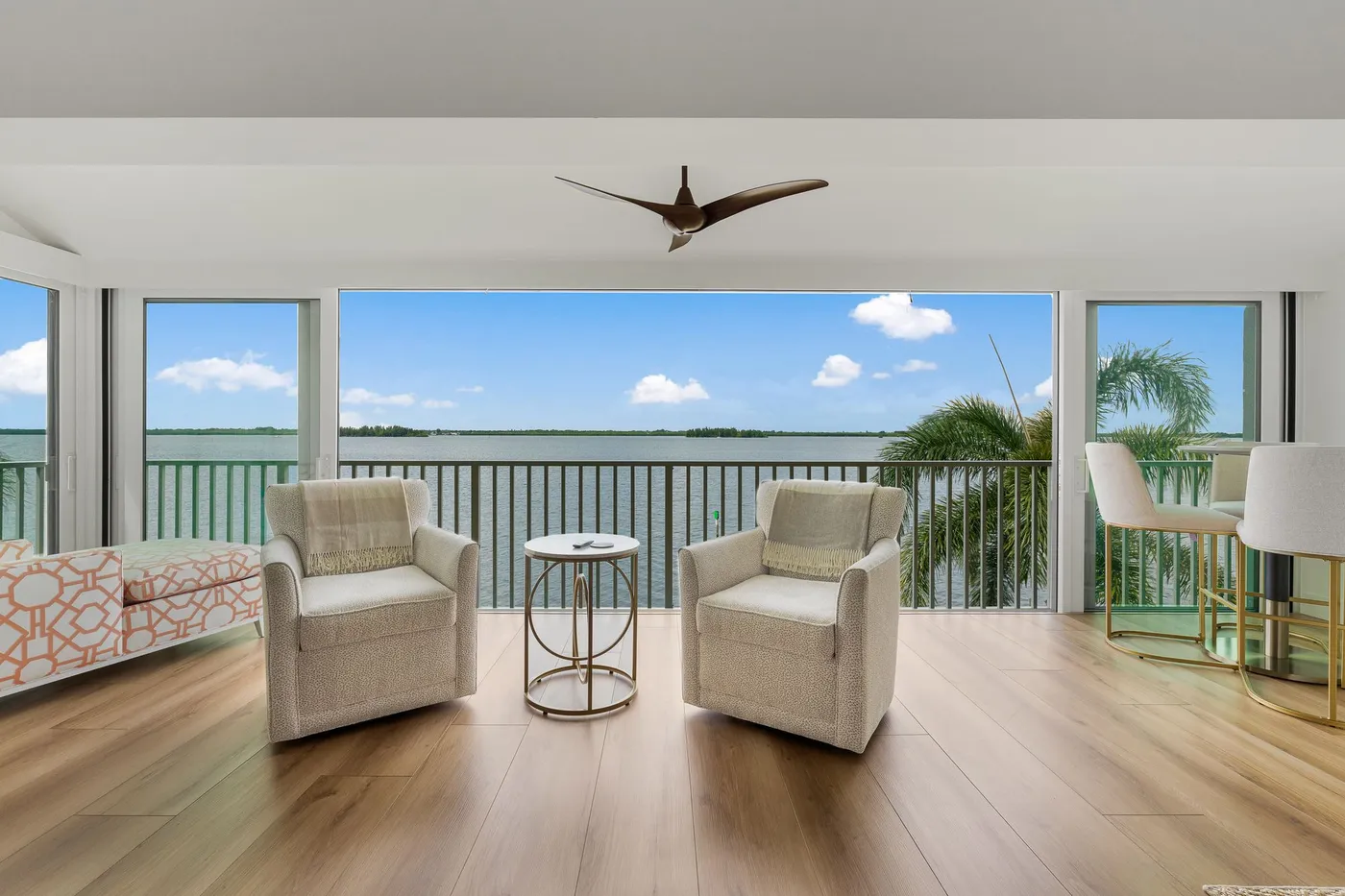 1776 Mooringline Drive, PH-C: the full width of the terrace, with water across the whole opening