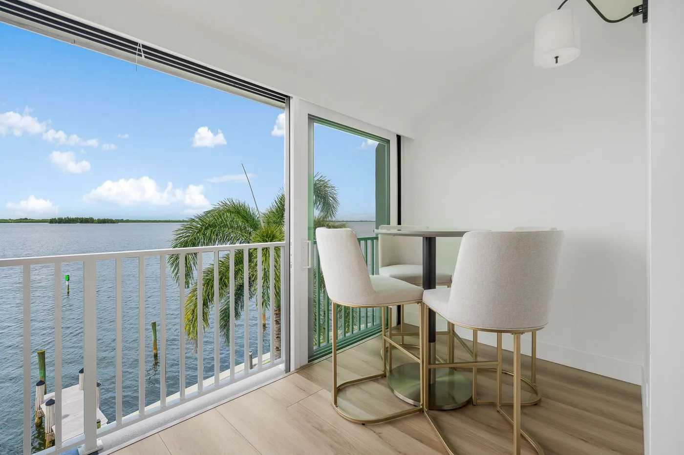 1776 Mooringline Drive, PH-C: the terrace corner with counter seating above the water