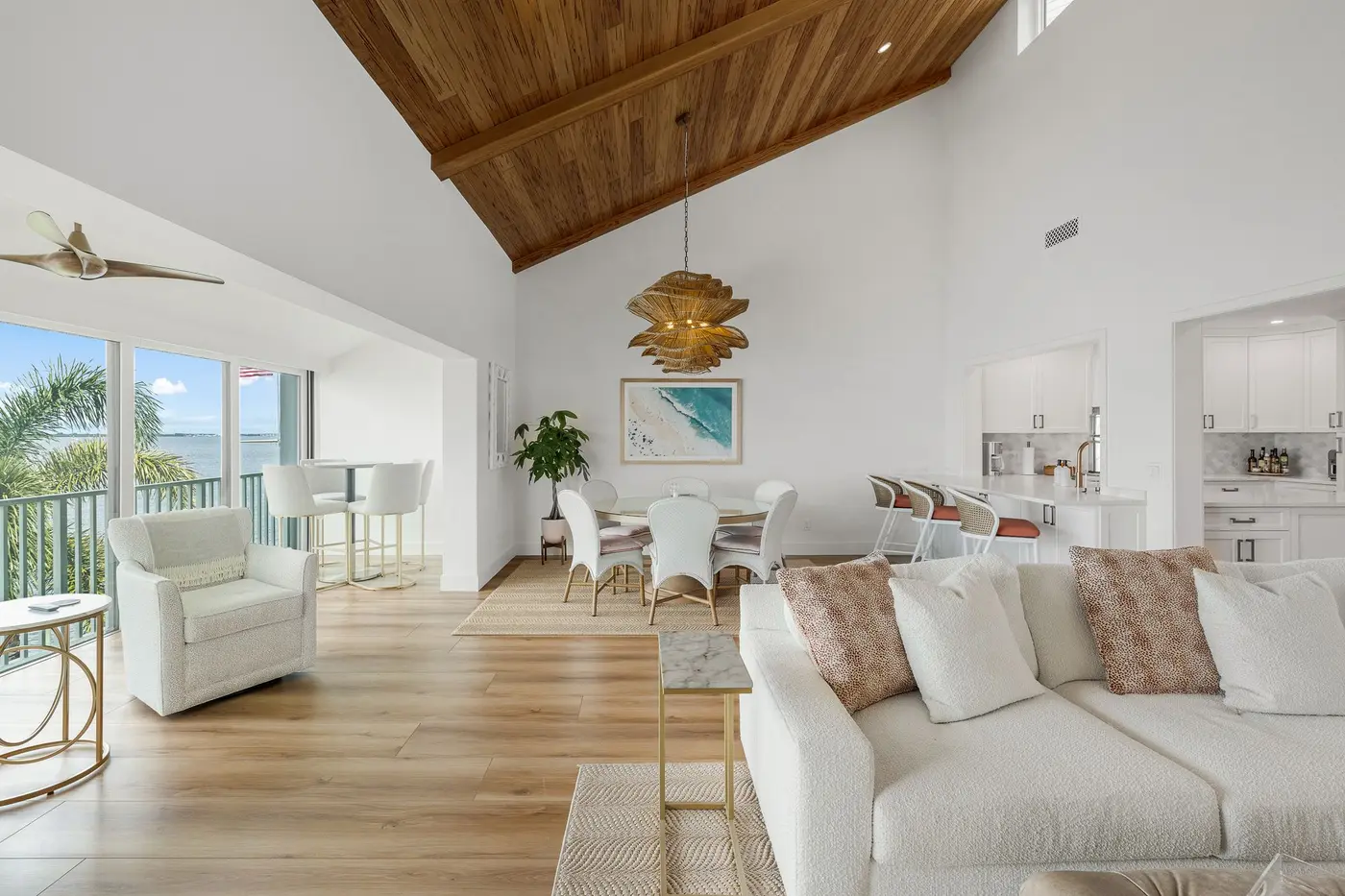 1776 Mooringline Drive, PH-C: the great room looking toward the terrace and the lagoon