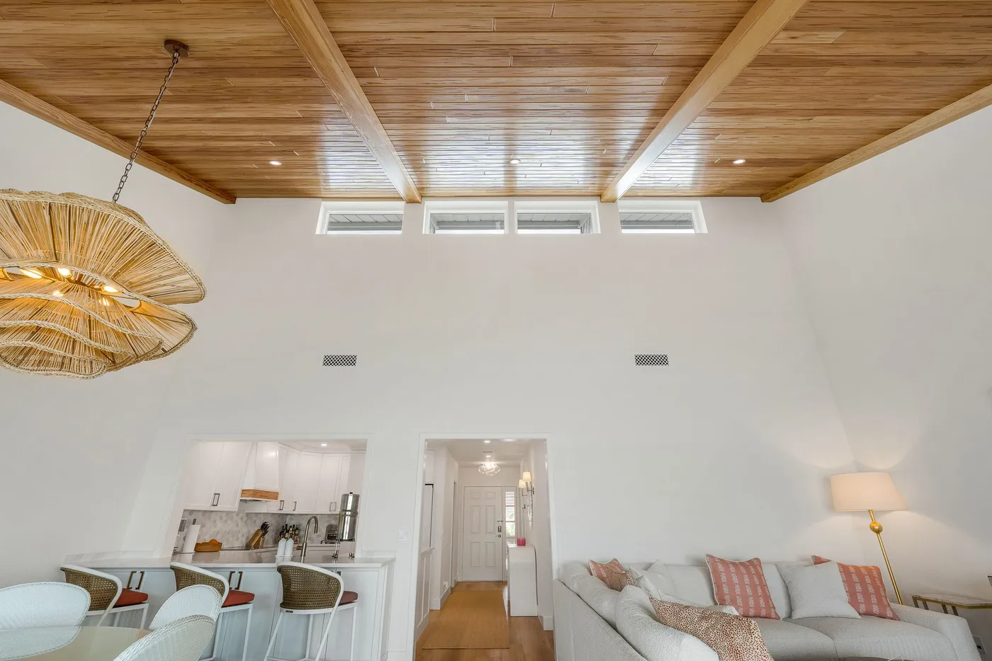 1776 Mooringline Drive, PH-C: the sloped cypress ceiling with clerestory windows above the living space