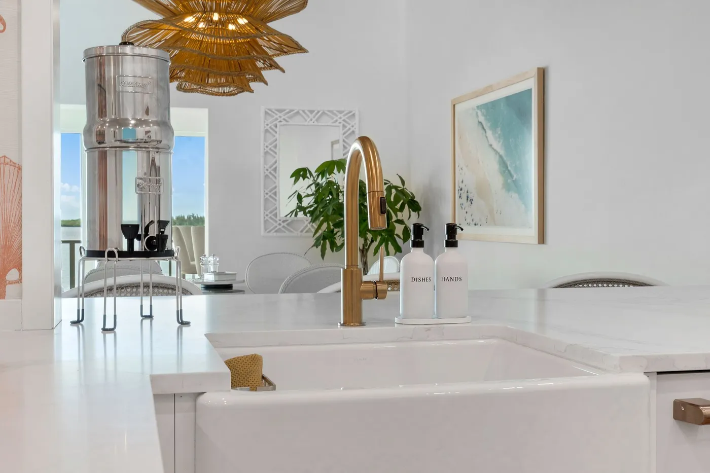 1776 Mooringline Drive, PH-C: the bar sink with its brass fittings