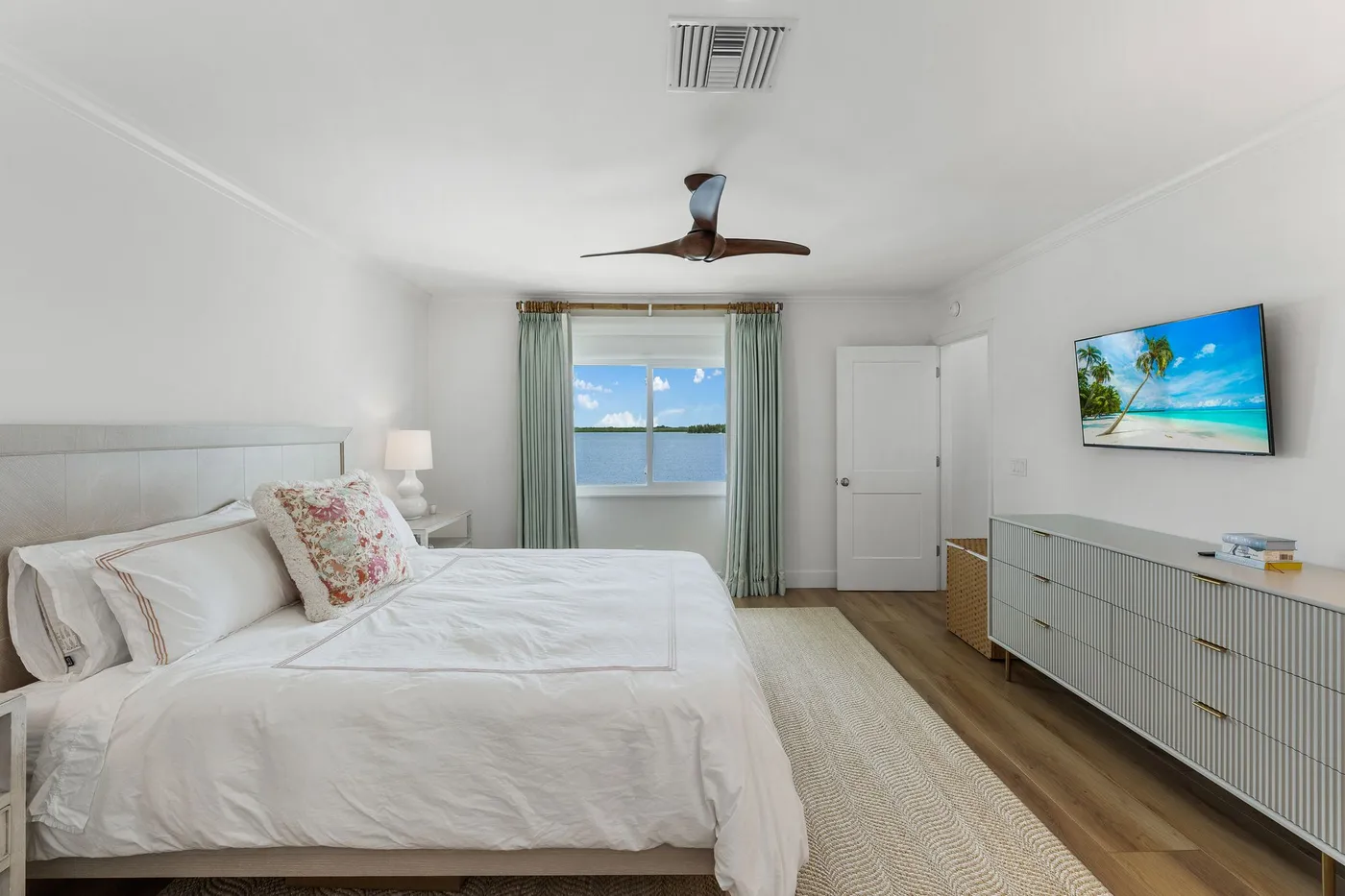 1776 Mooringline Drive, PH-C: the primary bedroom with water through the window