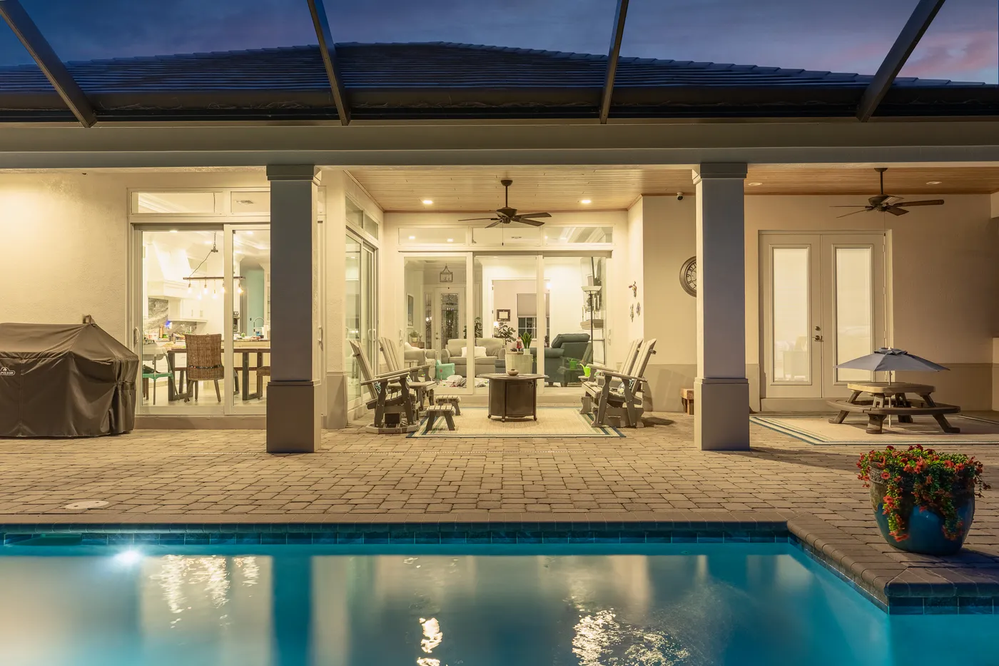2340 Pine Valley Road: the pool at dusk, looking back at the house