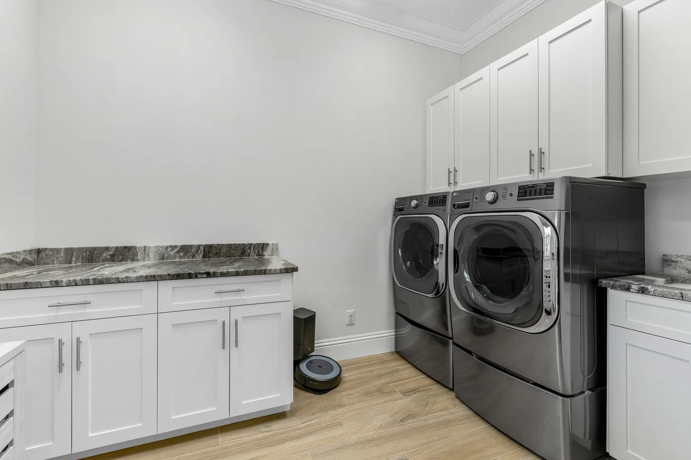 2340 Pine Valley Road: the oversized laundry, with wet sink and storage