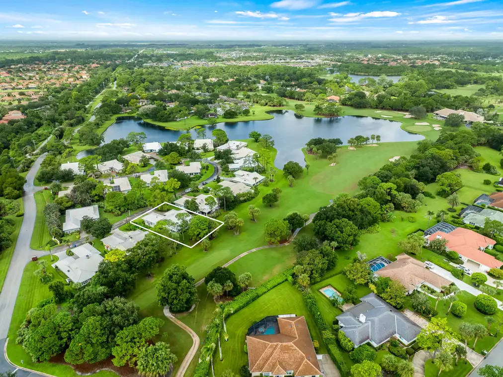 5795 Magnolia Lane: an aerial with the lot outlined, showing the residence is fully detached